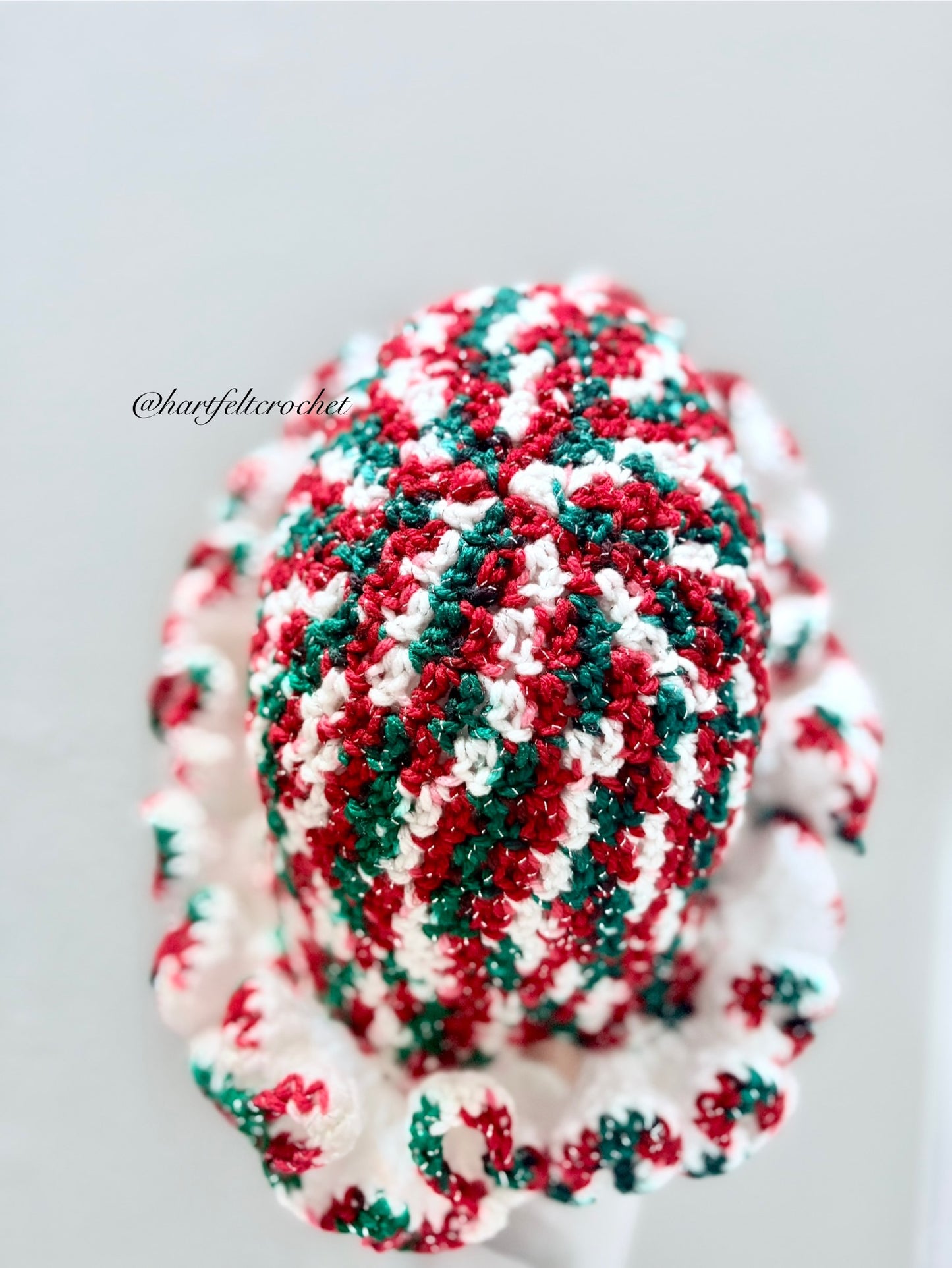 Handmade Christmas crochet hat with ruffled brim in red, green, and white – Hartfelt Crochet