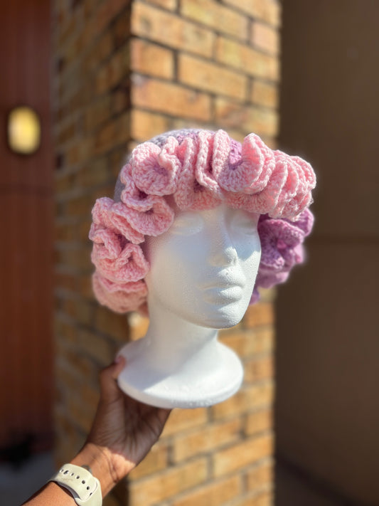 Handmade pink and lavender crochet ruffle brim hat on mannequin – Hartfelt Crochet